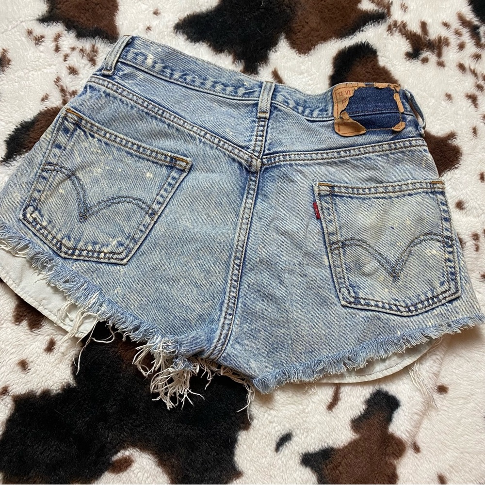 Vintage Levi’s Light Wash Distressed Denim Shorts